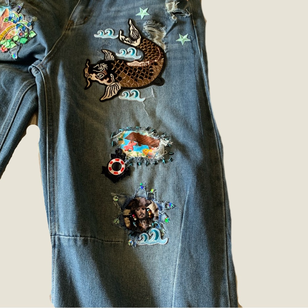 Upcycled Embroidered, Patched, and Distressed Barrel Jean with a Caribbean Theme - Picture 9 of 14